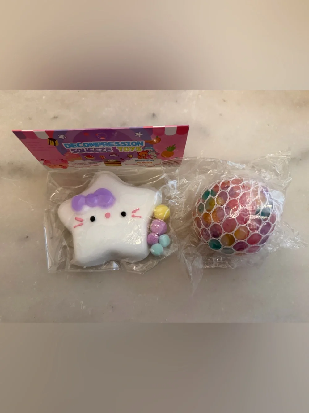 2 Pack Squishy Hello Kitty (not licensed), and Orbeeze squishy Toy